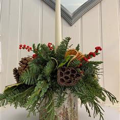 Christmas table arrangement with candle